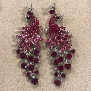 Peacock earrings.